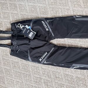 Women’s blackm Klim snow pants